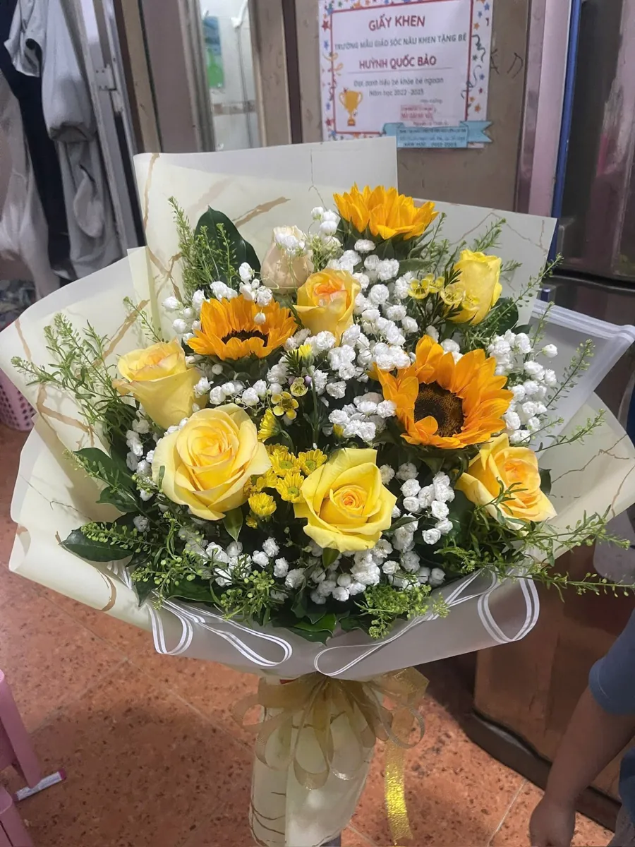 Bó hướng dương hồng vàng - ảnh 1